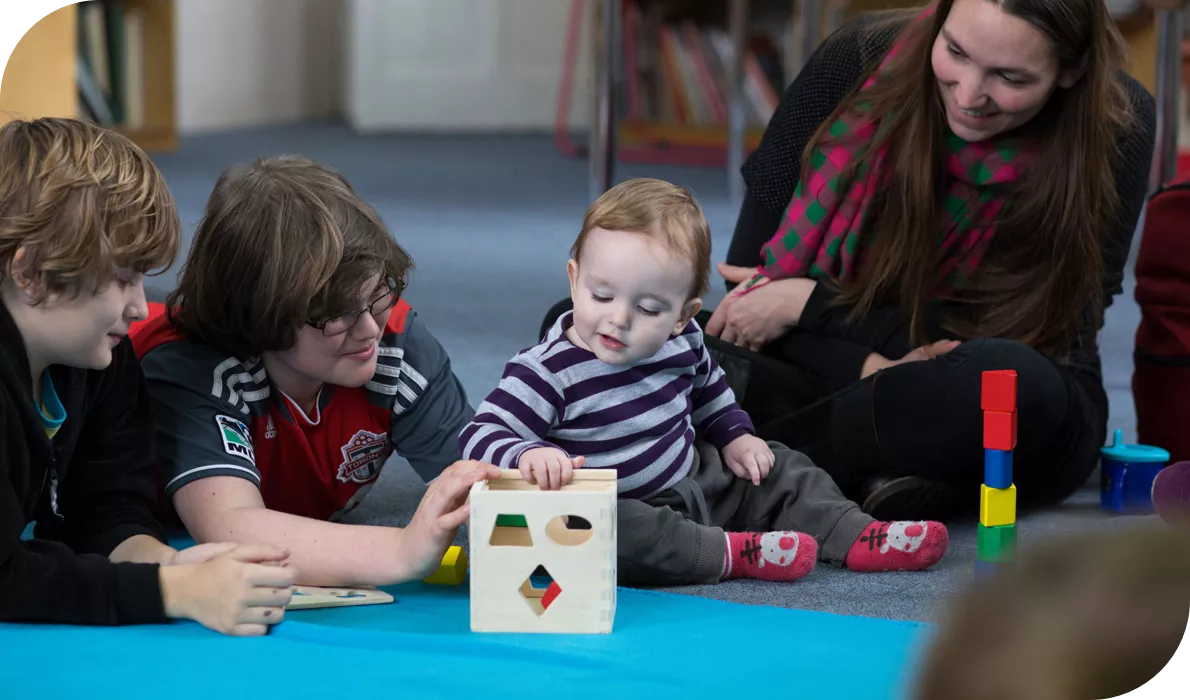 Young boy playing with class