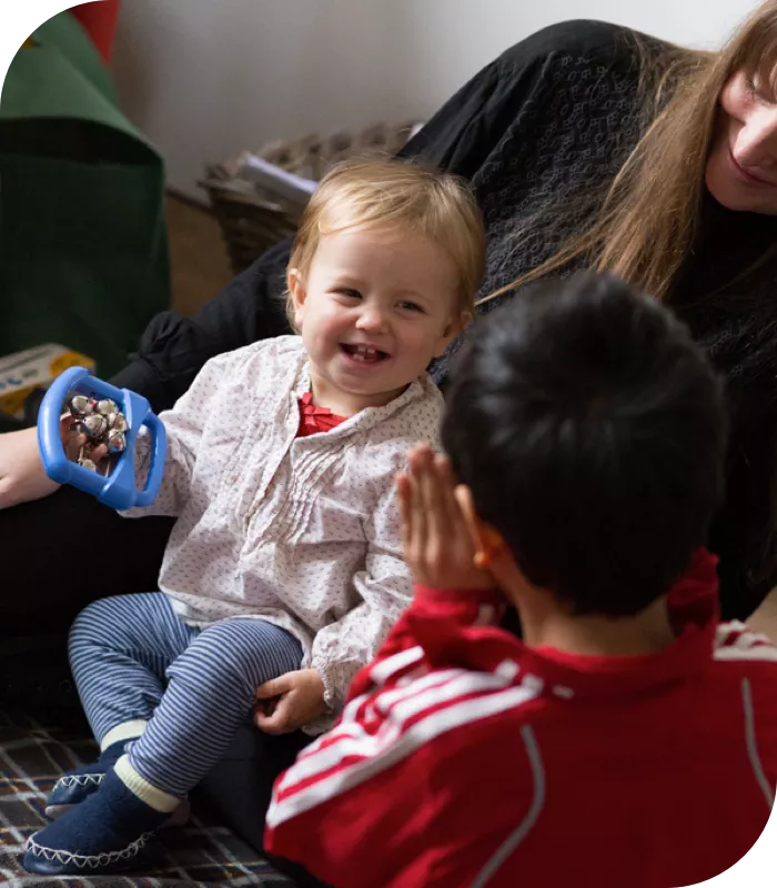 Young girl playing with class